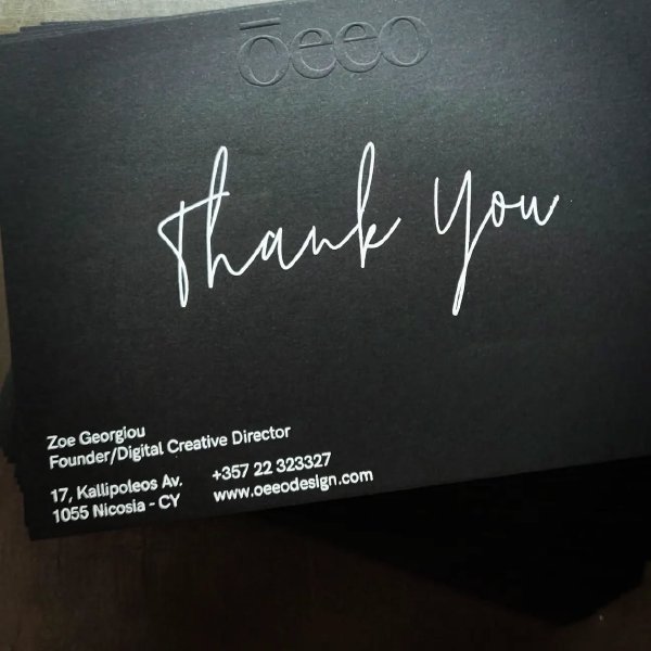 Emboss & white foil on black paper